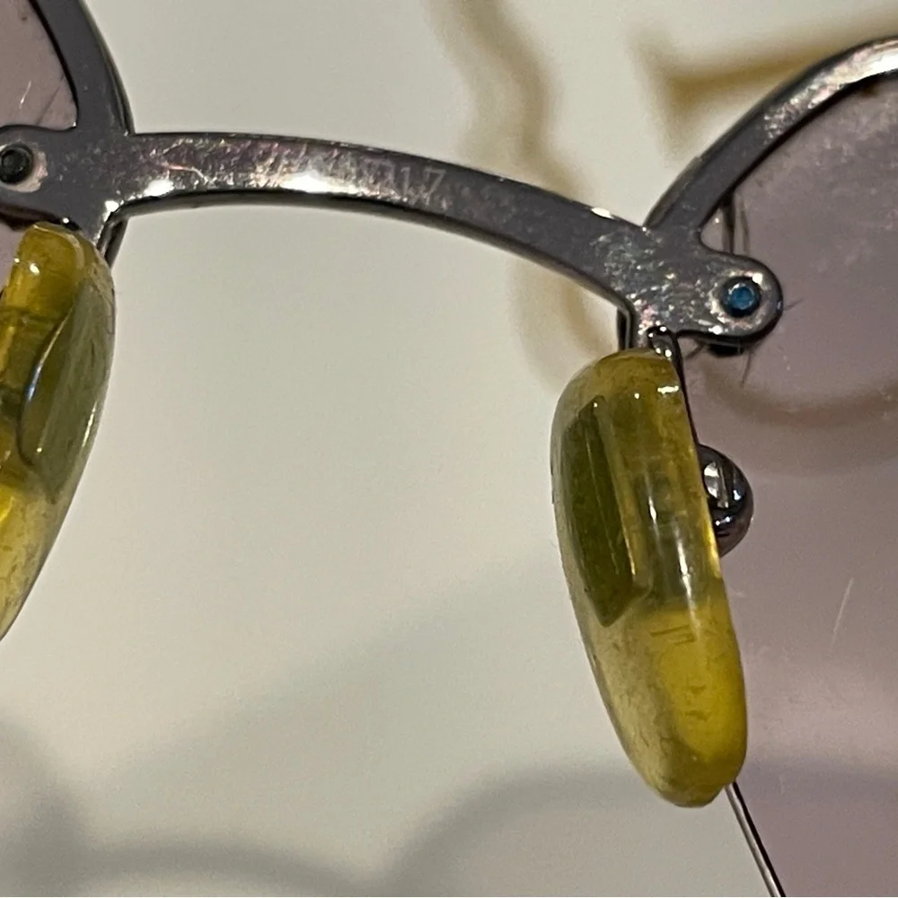 Coach Gold and Gray Sunglasses Rimless Design